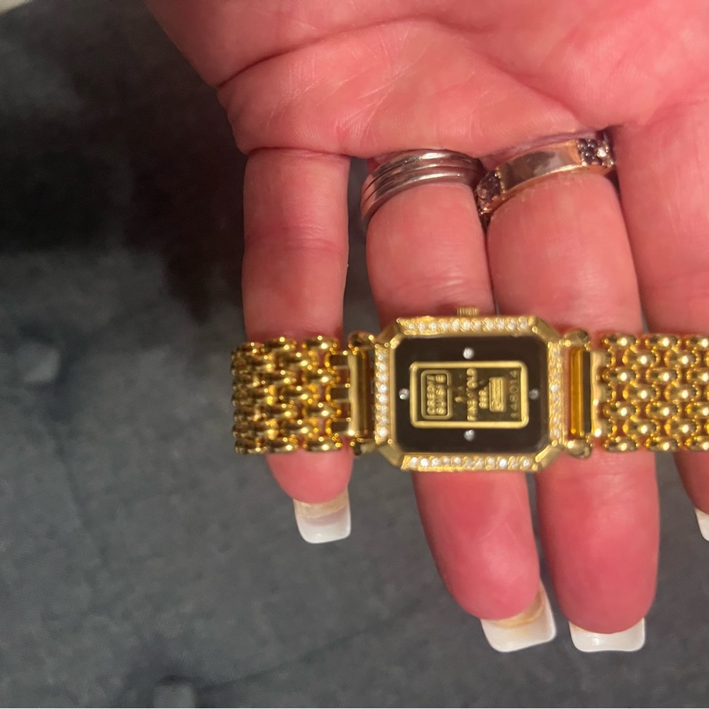 Gold and Black Watch with Diamond Accents